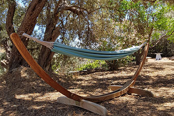 A hammock in the garden of Andromeda in Sifnos